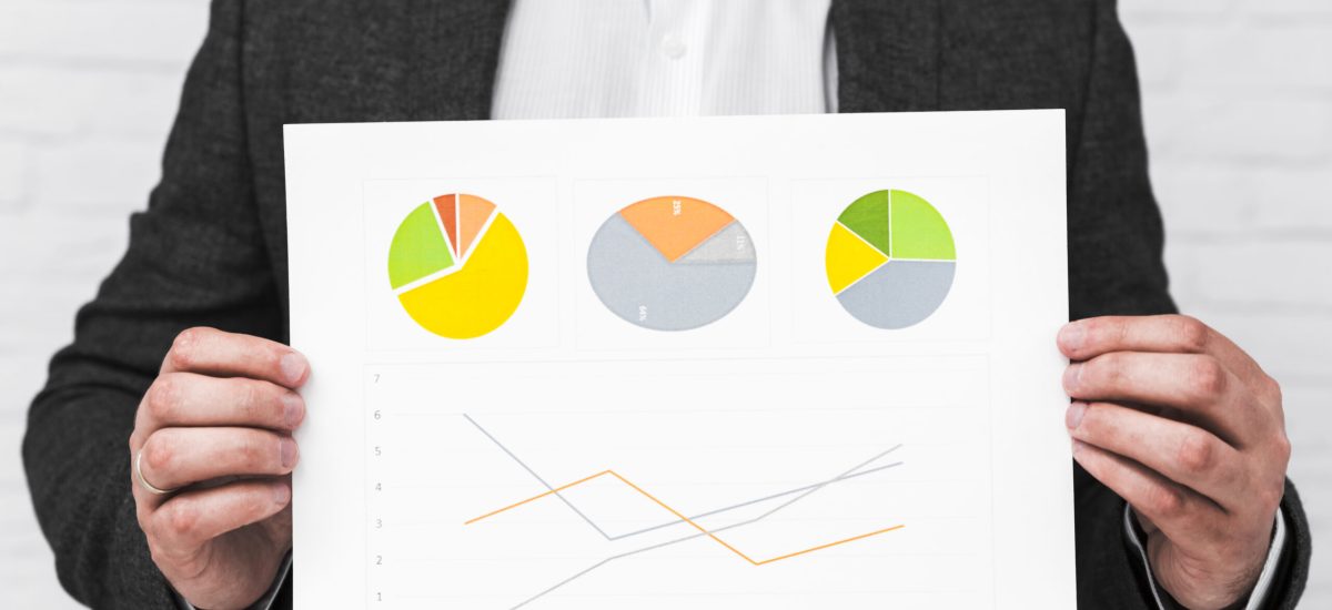 business-people-showing-charts-statistics business-people-showing-charts-statistics